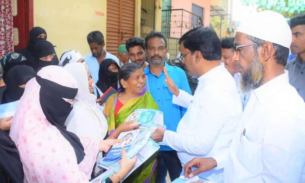 Deputy Chief Minister Amzath Basha distributing the pensions under the YSR Pension Kanuka at 25th division in Kadapa on Sunday