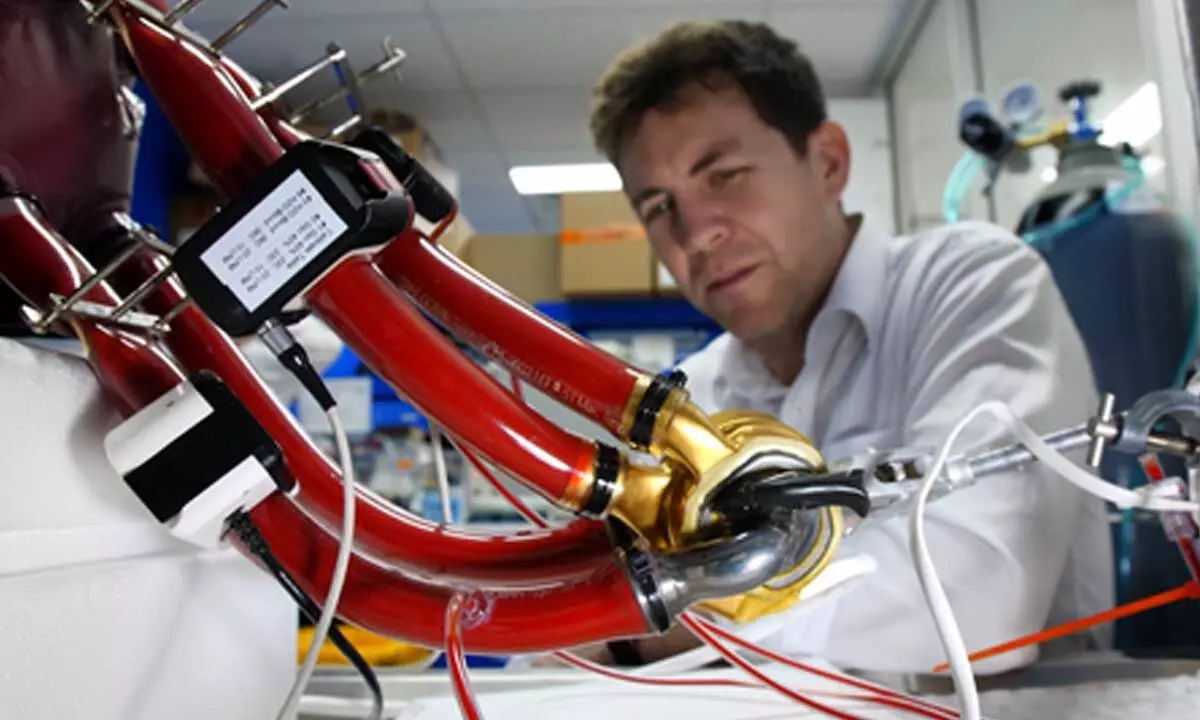 Australian man becomes world-1st to live with durable artificial heart for over 100 days